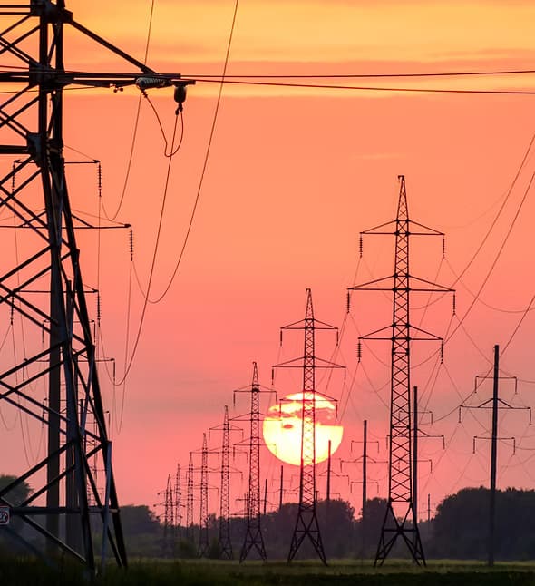Engineers working on a smart grid monitoring system